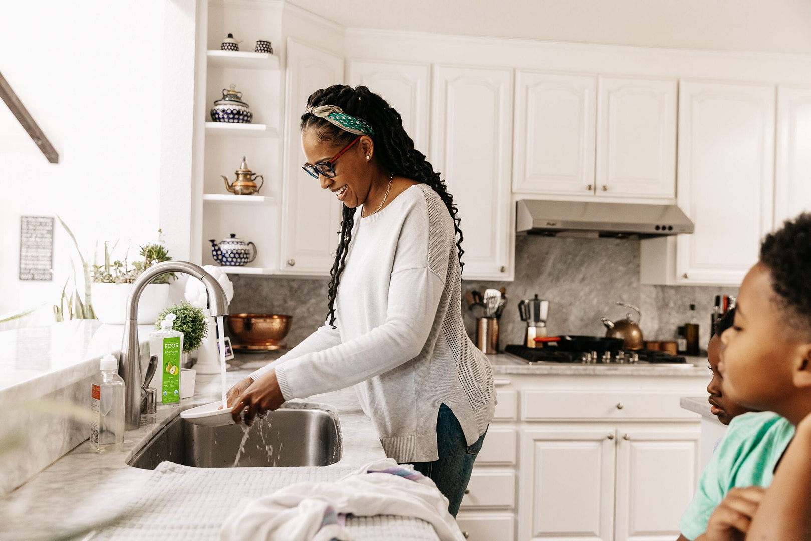 Woman washing dishes