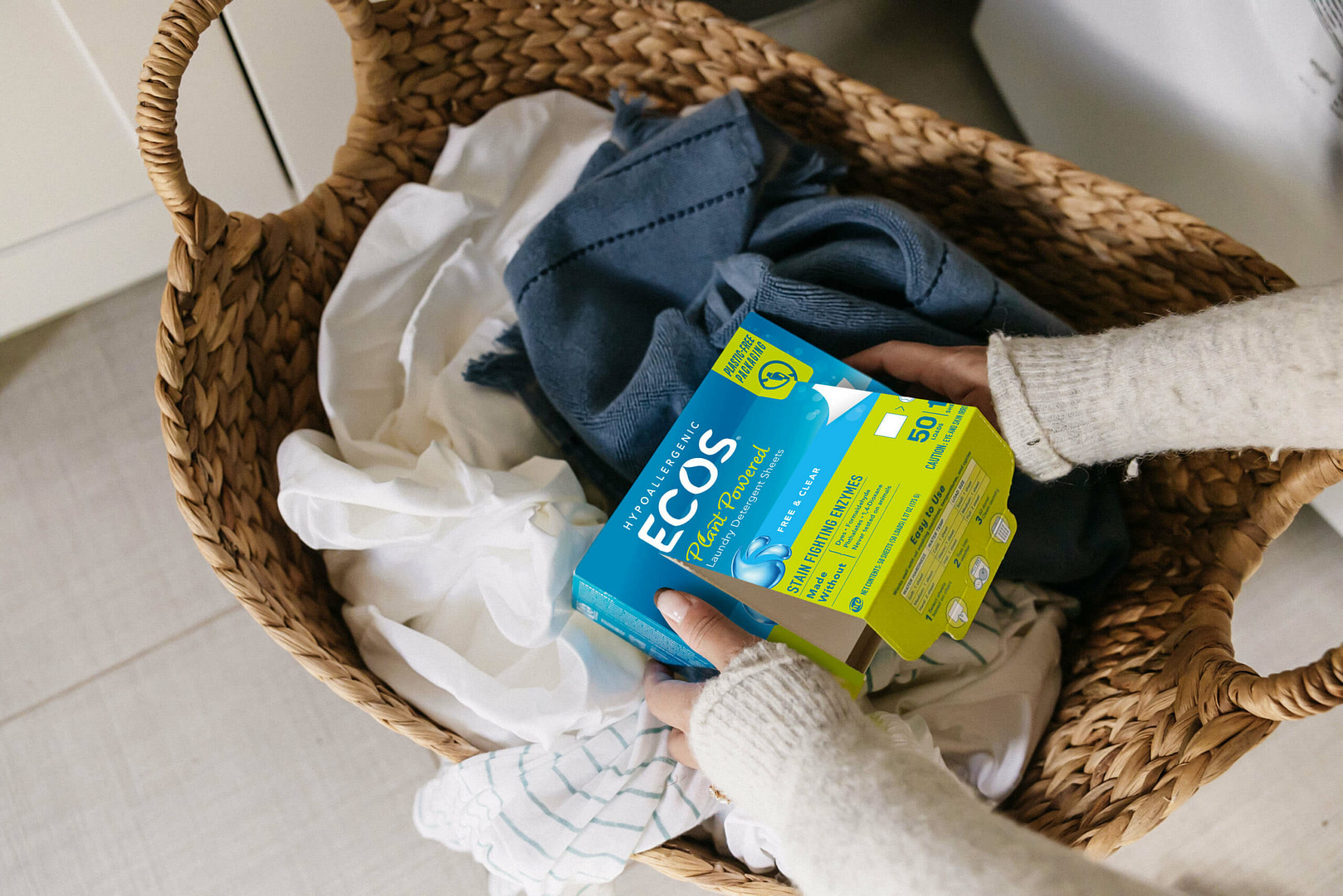 ECOS laundry sheets in a laundry basket