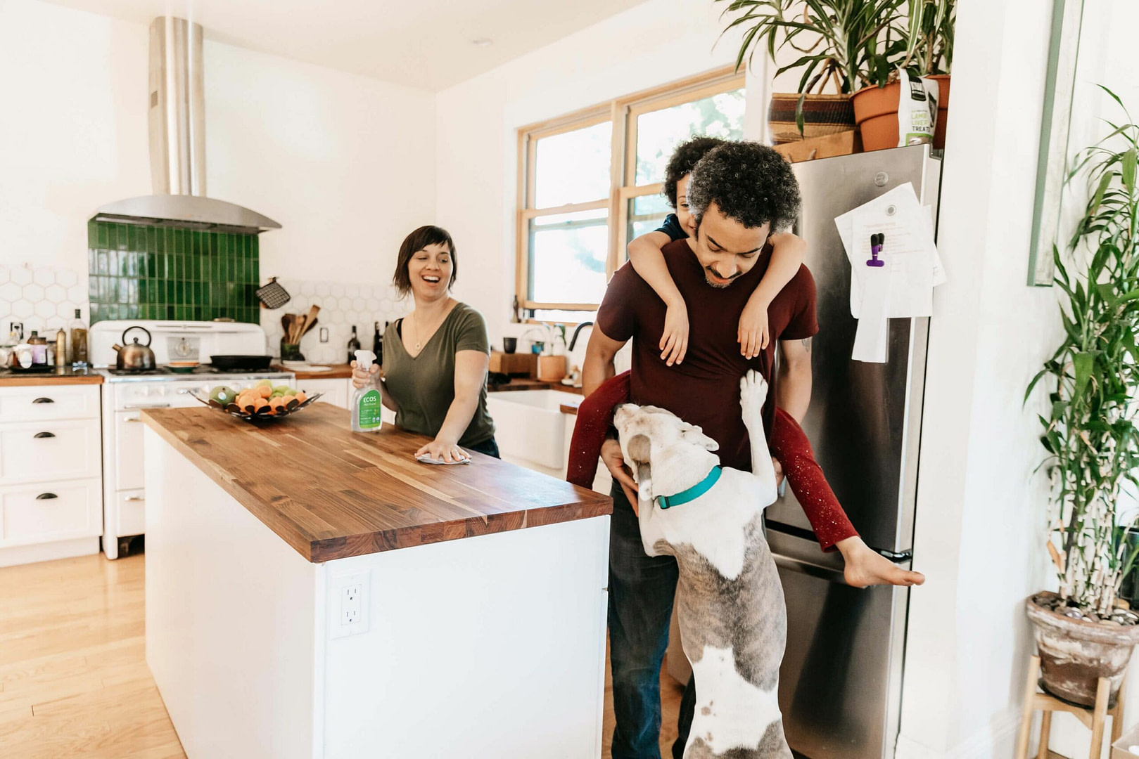 Happy Family Cleaning Kitchen