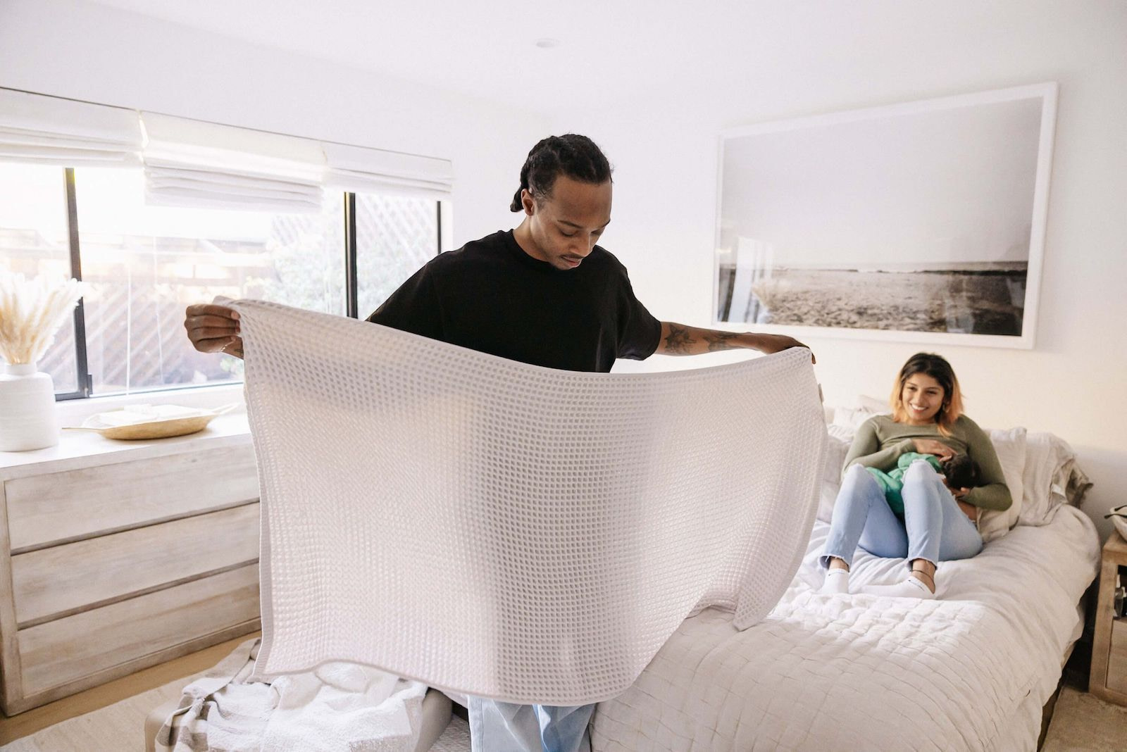 Parents Folding Laundry