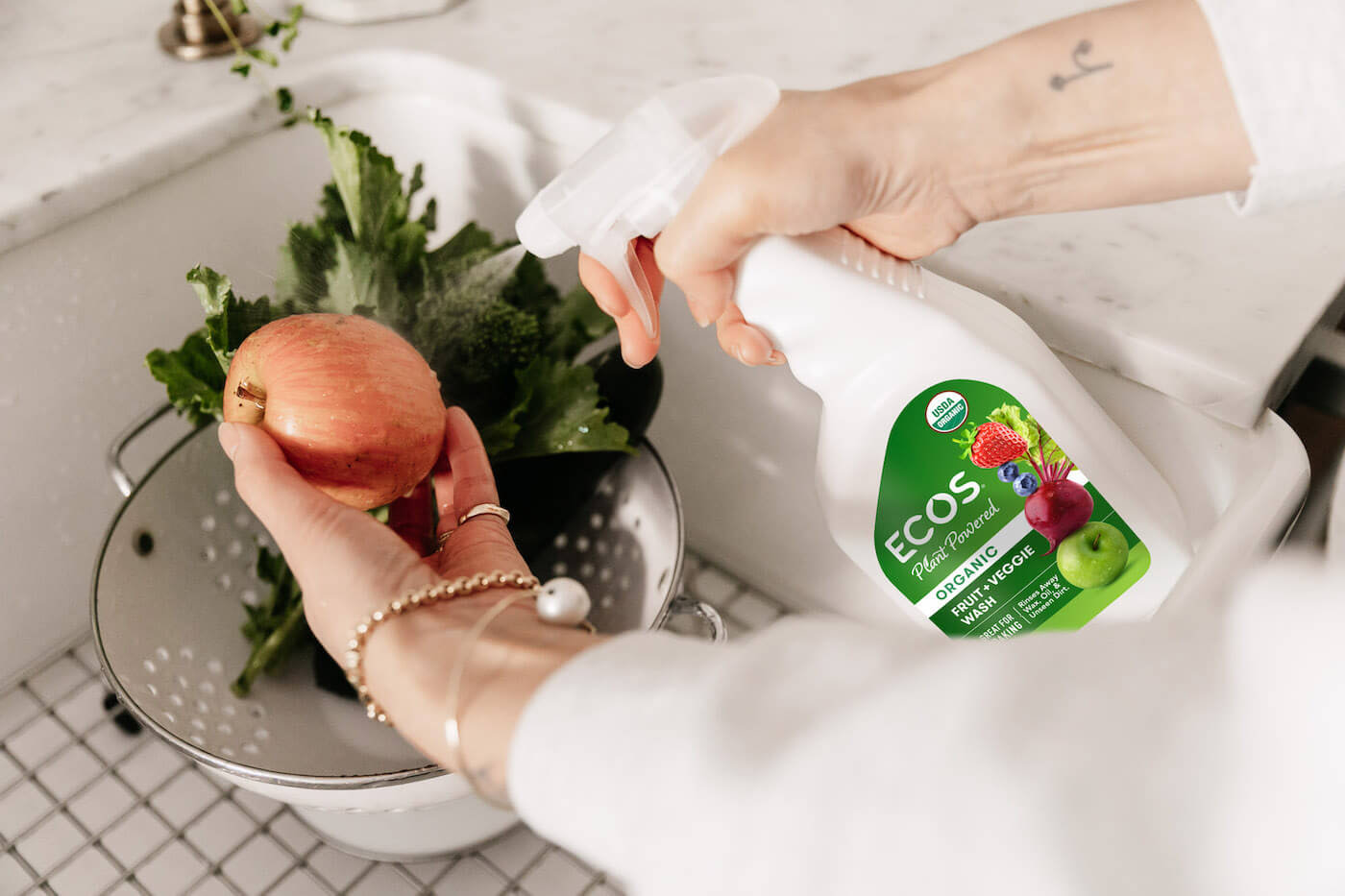 Spraying Produce With ECOS Organic Fruit Veggie Wash