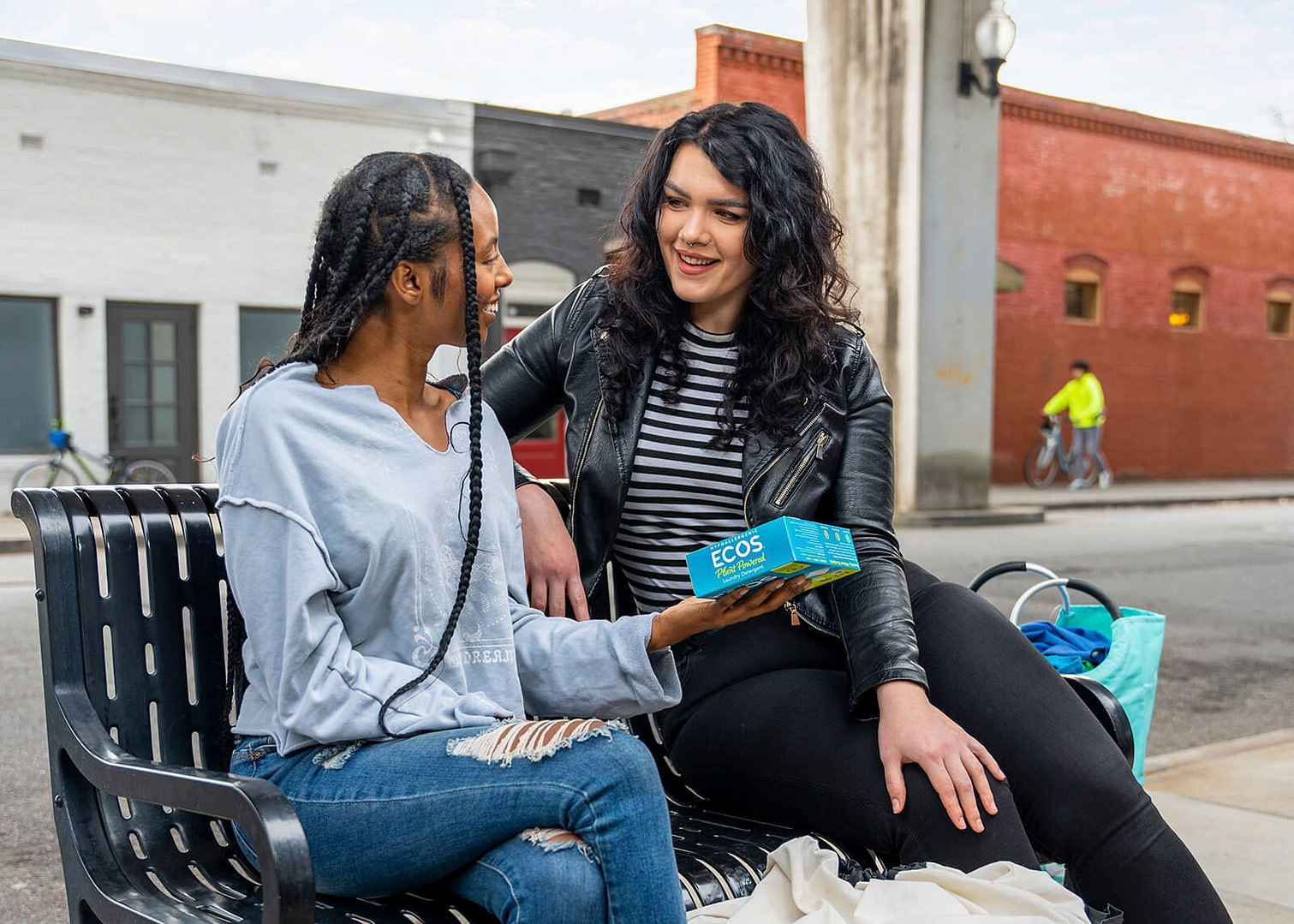 Woman Sharing Laundry Sheets